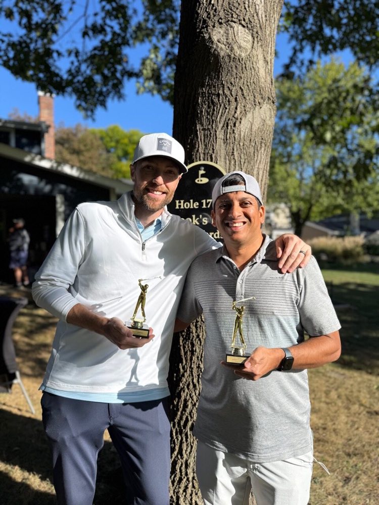 2024 champions Chris Granow and Arvin Joshi with their trophies