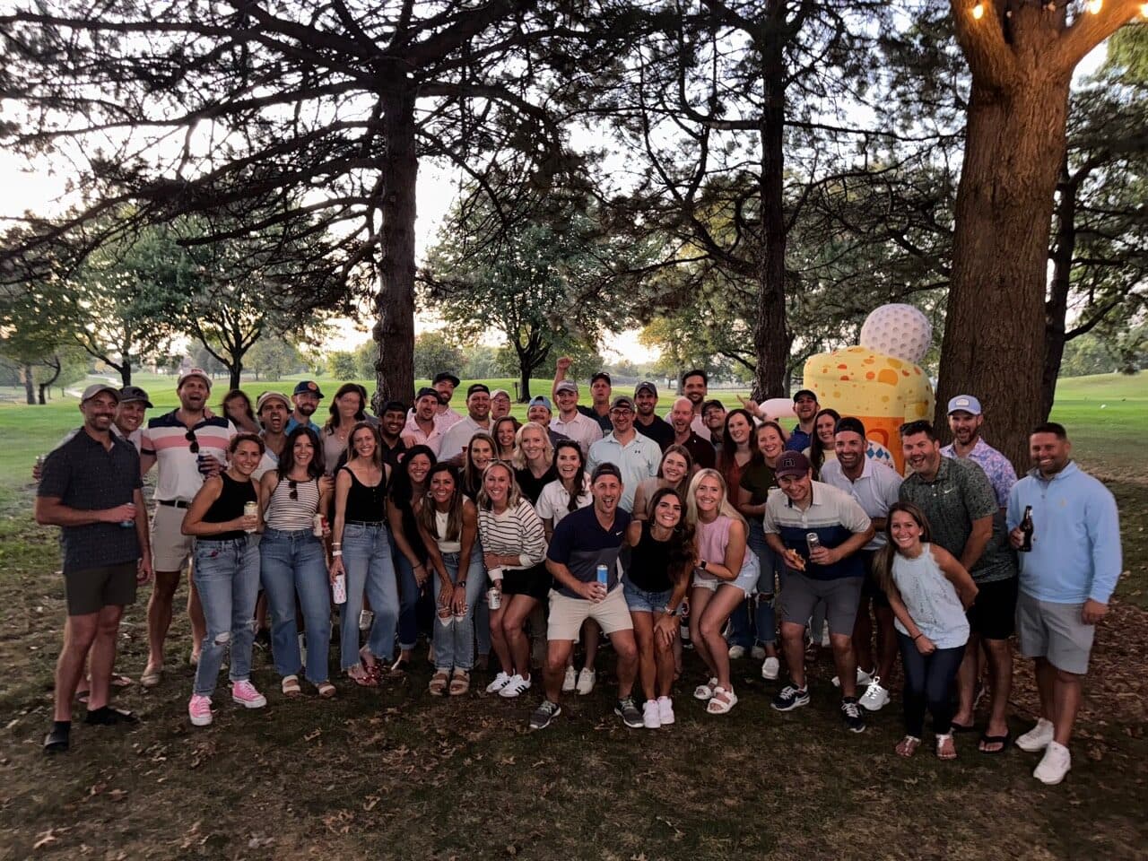 Friends gathered at a past Shooktoberfest event